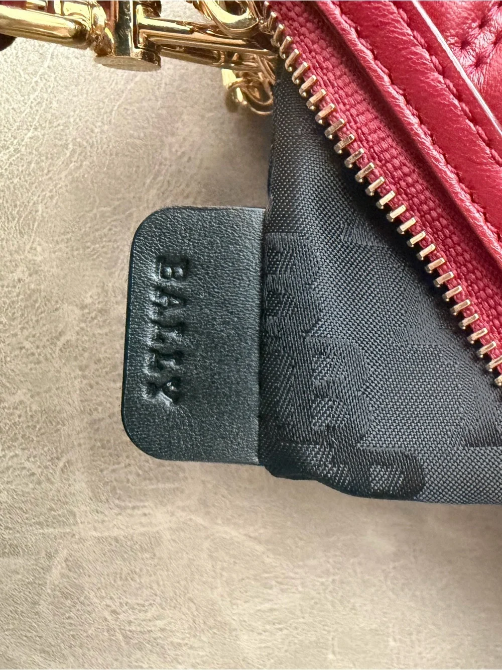 Bally Drice Burgundy Quilted Leather Crossbody with Signature Stripe